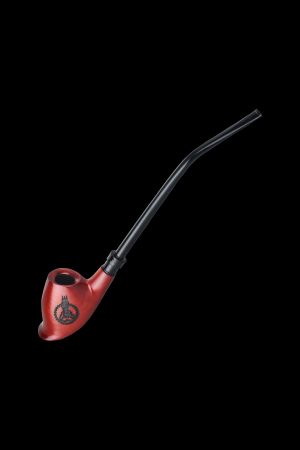 Red glass cannabis oil burner pipe with a skull and laurel wreath design, isolated on black.