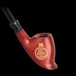 Red glass pipe with gold lighthouse design against a black background.