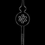 A straight-on view of the Pulsar Swiss Diffuser Vapor Straw Dab Collector, featuring a clear glass body and intricate straw-like design.