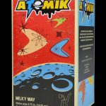 Retro-style packaging for “Atomik Milky Way” water pipe, featuring a space-themed design with a cartoon rocket and planets.