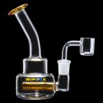 Clear glass oil rig with a quartz banger, featuring yellow accents and the brand name "XIMTA".