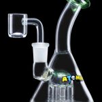 Glass dab rig with a honeycomb perc diffuser and quartz nail.