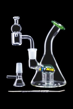 Glass rig with attachments for dabbing cannabis concentrates.