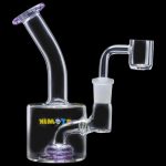 The Atomik Little Dipper Dab Rig is shown in a side view, highlighting its clear glass construction and compact size.