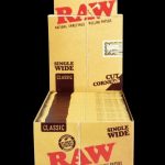 A front view of the "RAW "Cut Corners" Single Wide Rolling Papers - 50 Pack" box, showcasing a simple, clean design.