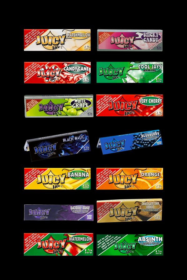 A grid of colorful, flavored rolling paper packs branded "JUICY JAYS," displaying flavors like marshmallow, candy cane, blueberry, banana, and watermelon, with legal disclaimers visible on each pack.