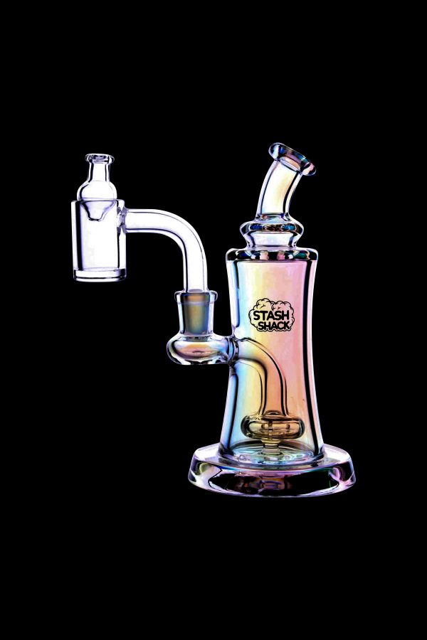 Iridescent glass dab rig with a quartz banger, branded "Stash Shack."