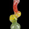Front view of the Rasta Bubbler Hand Pipe, a colorful glass bubbler with a curved design against a dark background.