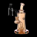 Amber glass dab rig with quartz banger, studio shot on black background.