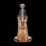 Amber glass rig with intricate percolators, isolated on a black background.