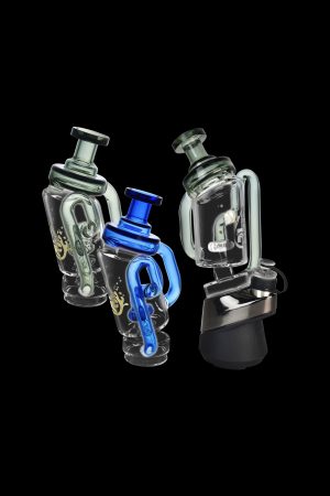 Two glass cannabis rigs with intricate designs, one featuring blue accents, against a black background.