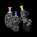 Glass dab rigs with colorful accents, studio shot on black background.