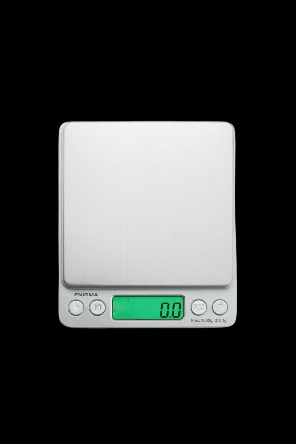 Digital scale with a white platform and green display, commonly used for measuring cannabis.