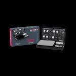 Product shot of a black and red Truweigh digital scale in its packaging, designed for precise cannabis measurement.