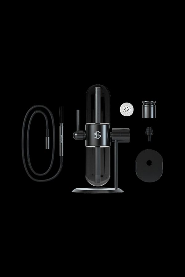 Black cannabis vaporizer device with disassembled components arranged around it on a black background.