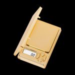 Gold digital scale for measuring cannabis.