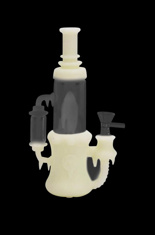 Yellow and black glass water pipe (bong) with dripping design.