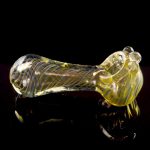 Front view of the Gold Fumed Spoon Pipe - Midas, showcasing its curved shape and gold fume accents against a dark background.