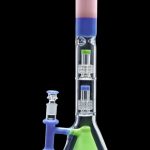 Blue and green glass bong with intricate percolators.