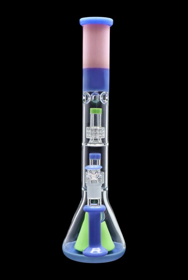 Blue and green glass bong with intricate percolators, isolated on a black background.