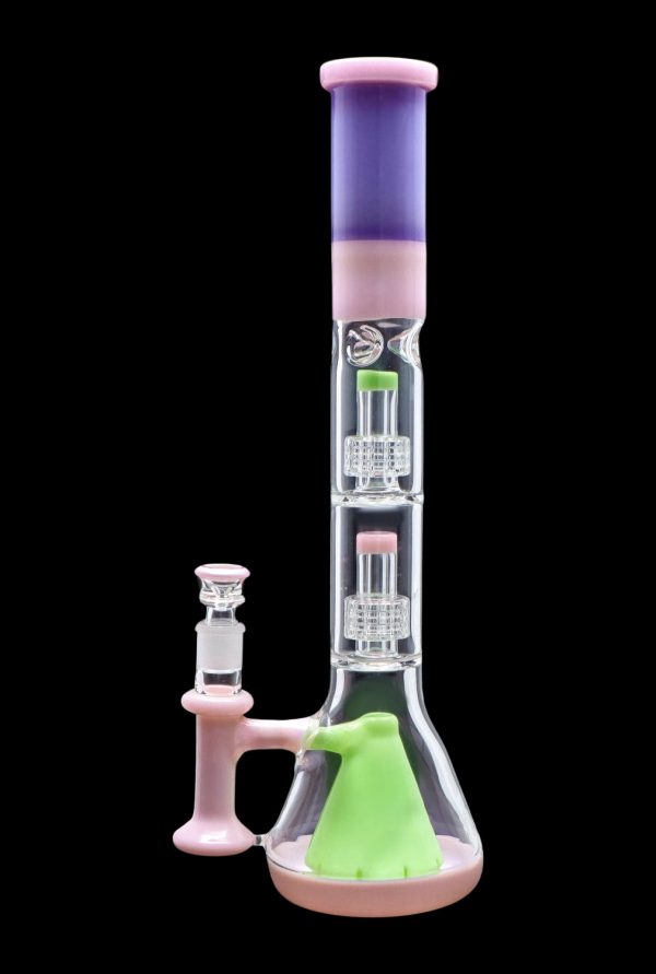 A colorful glass bong with multiple percolators, featuring pink, green, and purple hues, against a black background.