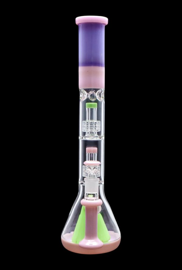Pink and purple glass bong with multiple bubblers against a black background.