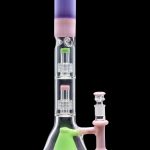 Pink and green glass bong with multiple percolators.