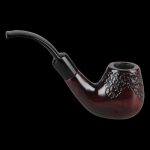 A side view of the Pulsar Engraved Bent Brandy, showcasing its curved shape and intricate detailing in a dark amber hue.