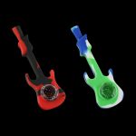 A close-up shot of the Silicone Guitar Hand Pipe with Glass Bowl, featuring a colorful, guitar-shaped design.