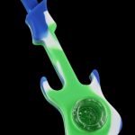 The Silicone Guitar Hand Pipe with Glass Bowl is shown in a bright, angled view, displaying its colorful, guitar-shaped design.