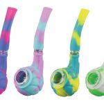 A close-up, angled view of the Silicone Hand Pipe with Glass Bowl, showcasing its colorful, patterned design.