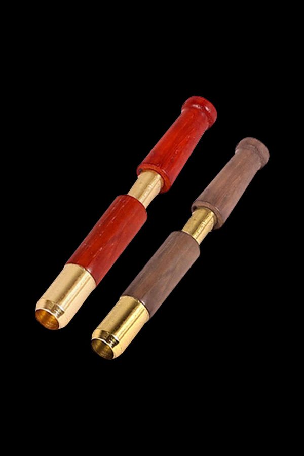 Close-up of the Single Hitter Ejector Taster Bat, showing its cylindrical shape and detailed metal accents against a dark background.