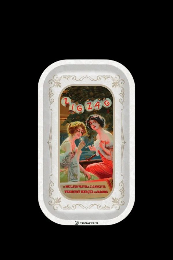 Vintage Zig-Zag rolling paper tin featuring an ornate design of two women in early 20th-century attire.
