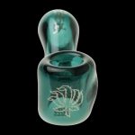 Front view of the “Puff Puff Pass “Sour Diesel” Strain Pipe, a curved glass pipe with a dark green hue.