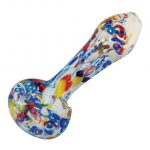A close-up angled view of The "Paint Splatter" Colorful Frit Glass Pipe, featuring vibrant, colorful frit patterns within clear glass.
