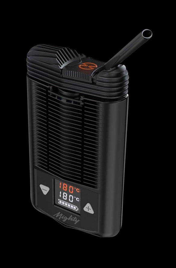 Front view of the Storz & Bickel Mighty+ Portable Vaporizer displaying a digital temperature readout on its black casing.