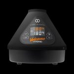 Front view of the Storz & Bickel Volcano Hybrid Vaporizer in onyx black, displaying a digital temperature reading of 180°C.