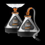 Front view of the Storz & Bickel Volcano Hybrid Vaporizer, displaying its silver housing and connected balloon on a black background.