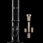 Glass bong with disassembled downstem components displayed alongside it on a black background.