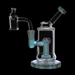 A vibrant teal glass dab rig with a complex bubbler design, isolated on a black background.