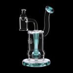 A clear glass water pipe (rig) with a turquoise accent and intricate design, isolated on a black background.