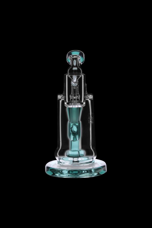 A turquoise glass rig with a bubbler and quartz insert, isolated on a black background.