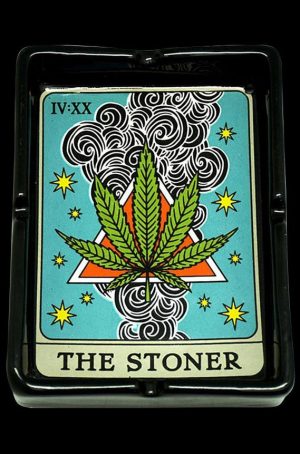 A close-up, top-down view of The Stoner Tarot Card Ashtray, depicting a colorful, illustrated tarot card design.