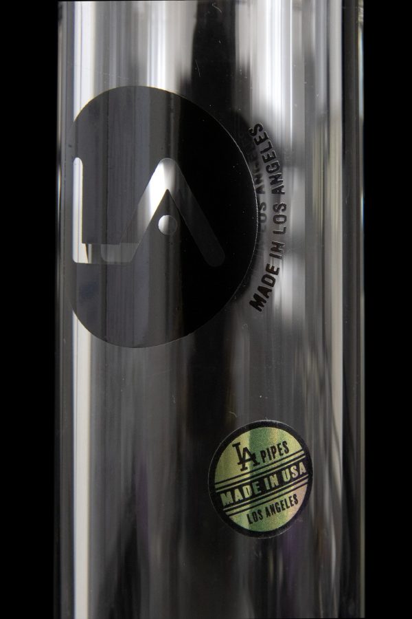 Close-up of a metallic cannabis pipe with a branded label reading “LA Pipes - Made in USA - Los Angeles.”