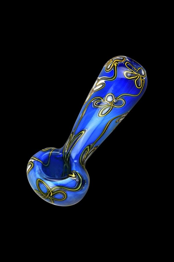 A side view of the Trippy Floral Double Glass Spoon Pipe, showcasing its colorful floral pattern on clear glass.