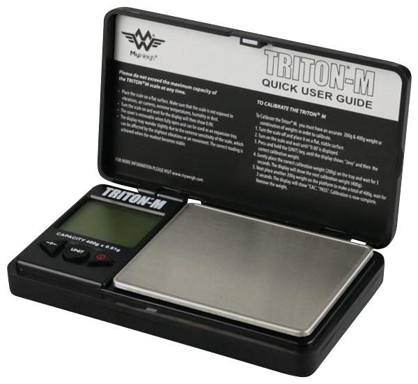 Close-up shot of the open Triton M 400g x 0.01g Scale By My Weigh, displaying instructions on its stainless steel weighing platform.