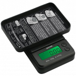 A close-up, angled view of the Truweigh Gauge Digital Mini Scale, displaying a reading on its digital screen.