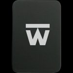 Front view of the Truweigh Gauge Digital Mini Scale, showcasing its compact, minimalist design against a dark backdrop.