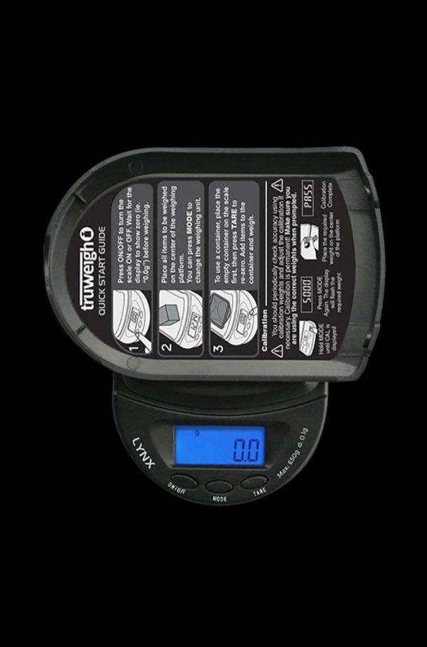 Close-up of the Truweigh Lynx Digital Mini Scale, displaying a digital readout with buttons and a black platform.