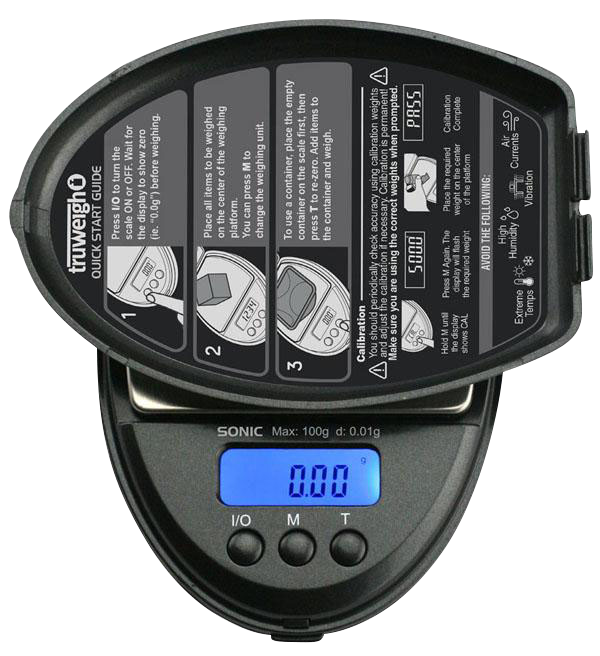 Close-up, top-down view of the Truweigh Sonic Digital Mini Scale, displaying a digital readout on its silver surface.